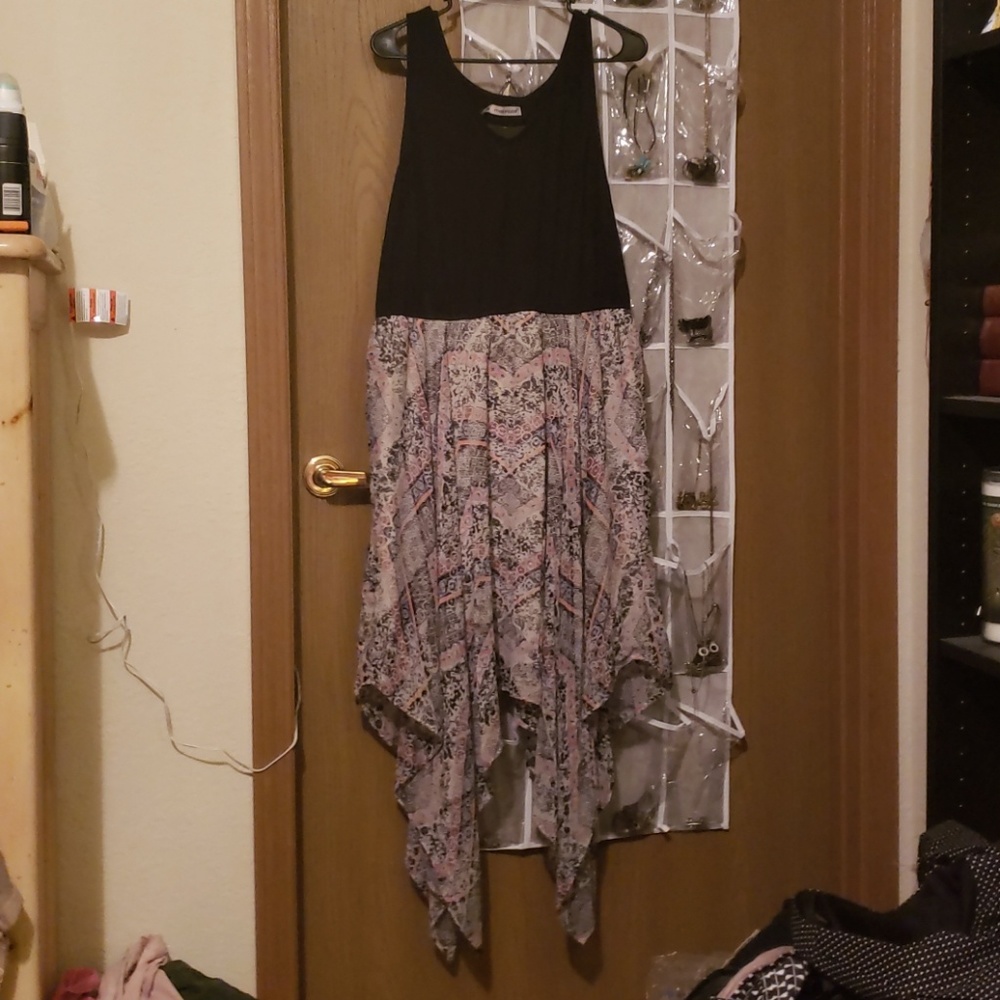 Black tshirt top and handkerchief hem dress